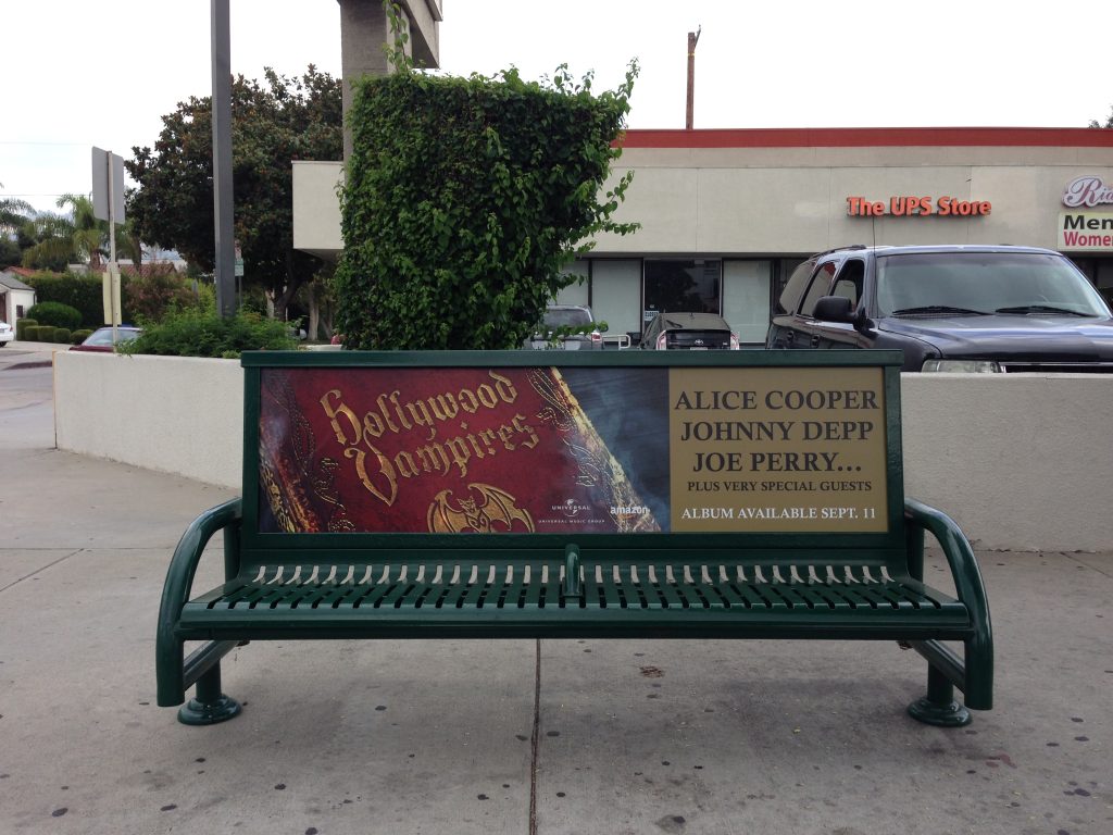 A Hollywood Vampires-themed bus bench advertisement